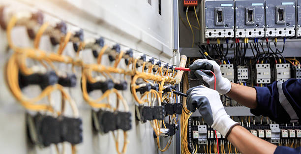 Professional Electrical Panel Upgrade technician working in Audubon County County, IA